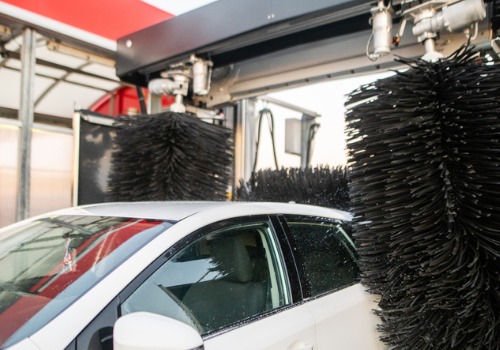 Car being washed with fresh and filtered water, thanks to Water Reclaim System in Chicago IL